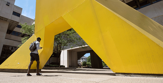 Yellow statue in front of Posvar Hall
